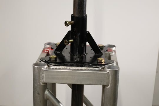 Bracket designed for mounting pipe to truss, base plates, or screwed directly to the stage. shown here mounted to the top of a piece of truss