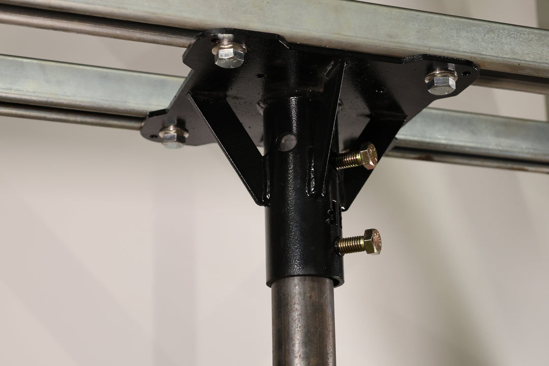 Bracket designed for mounting pipe to truss, base plates, or screwed directly to the stage. shown here mounted to unistrut in a ceiling, for mounting a projector