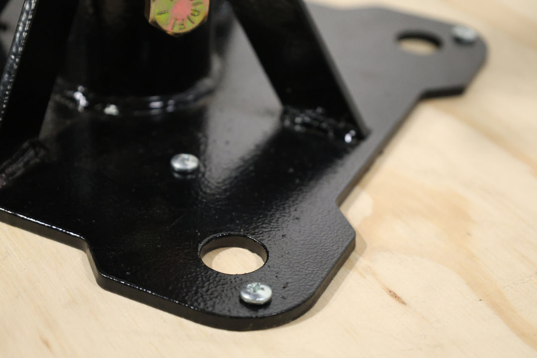 Bracket designed for mounting pipe to truss, base plates, or screwed directly to the stage. shown here a close up of screwing to the stage floor